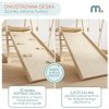 Drewniany domowy plac zabaw ze zjeżdżalnią, ścianką wspinaczkową i huśtawką